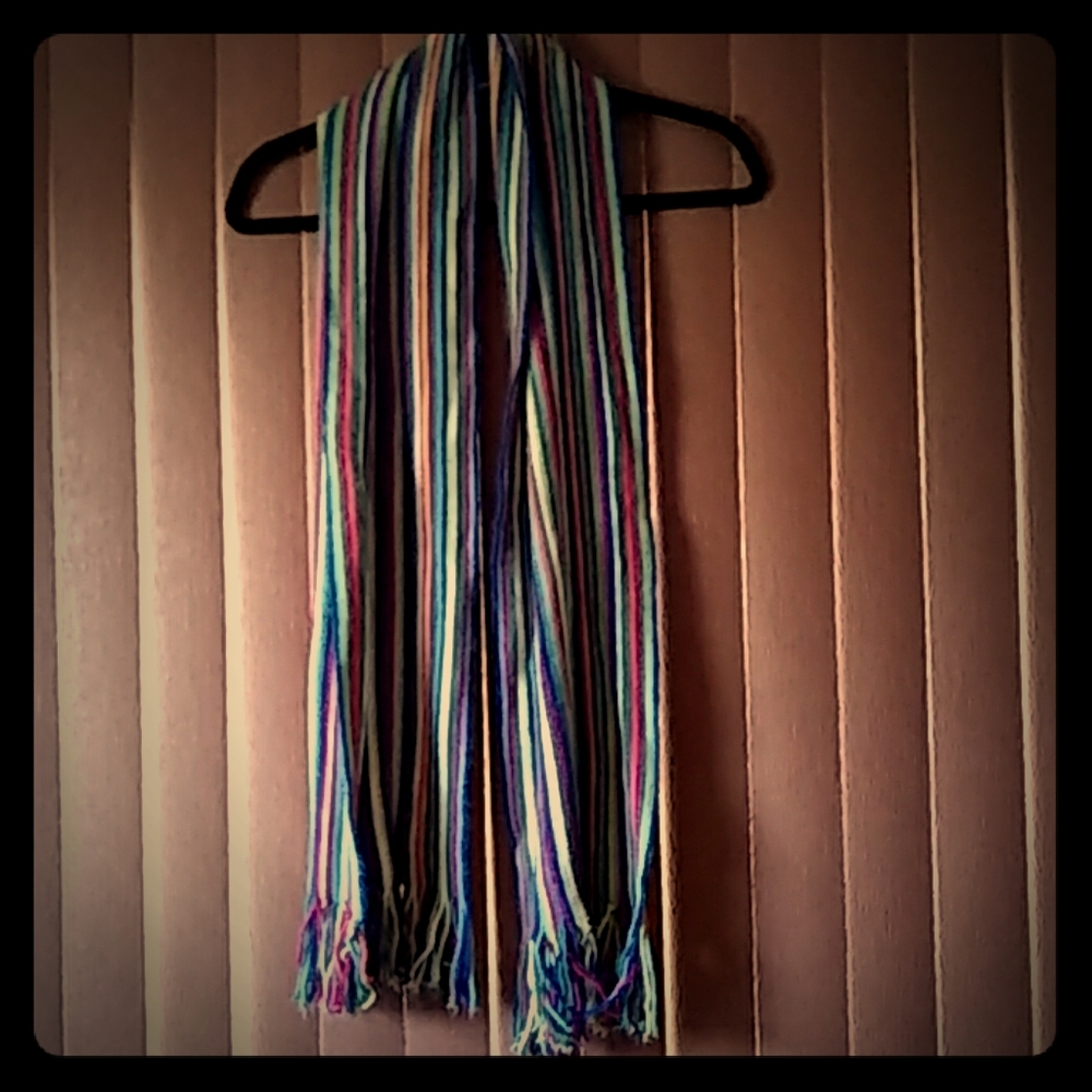 Adorable multi colored striped scarf.